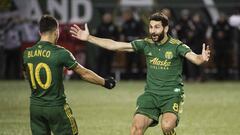 Mar 3, 2017; Portland, OR, USA; Portland Timbers midfielder Diego Valeri (8) celebrates with midfielder Sebastian Blanco (10) after scoring a goal during the second half against the Minnesota United at Providence Park. Mandatory Credit: Troy Wayrynen-USA TODAY Sports