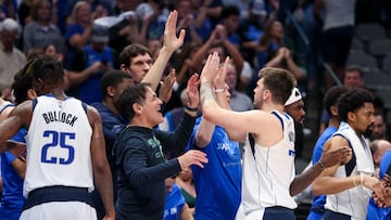 May 6, 2022; Dallas, Texas, USA; Dallas Mavericks guard Luka Doncic (77) celebrates with owner Mark Cuban and teammates after leaving the game during the fourth quarter against the Phoenix Suns in game three of the second round of the 2022 NBA playoffs at American Airlines Center. Mandatory Credit: Kevin Jairaj-USA TODAY Sports