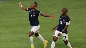 Ecuador's defender #07 Pervis Estupinan (L) celebrates scoring with Ecuador's forward #13 Enner Valencia before his goal was disallowed during the Qatar 2022 World Cup Group A football match between the Netherlands and Ecuador at the Khalifa International Stadium in Doha on November 25, 2022. (Photo by ADRIAN DENNIS / AFP)