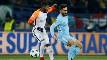 Soccer Football - Champions League - Shakhtar Donetsk vs Manchester City - Metalist Stadium, Kharkiv, Ukraine - December 6, 2017 Manchester City's Ilkay Gundogan in action with Shakhtar Donetsk's Fred REUTERS/Valentyn Ogirenko