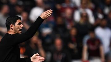 Arsenal's Spanish manager Mikel Arteta reacts during the English Premier League football match between West Ham United and Arsenal at the London Stadium, in London on April 16, 2023. (Photo by Ben Stansall / AFP) / RESTRICTED TO EDITORIAL USE. No use with unauthorized audio, video, data, fixture lists, club/league logos or 'live' services. Online in-match use limited to 120 images. An additional 40 images may be used in extra time. No video emulation. Social media in-match use limited to 120 images. An additional 40 images may be used in extra time. No use in betting publications, games or single club/league/player publications. /