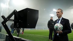  Referee Martin Atkinson looks at the VAR machine by the pitch before the match  