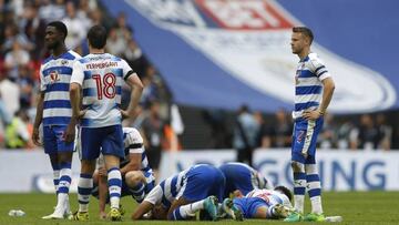 Reading players look dejected after losing the penalty shootout