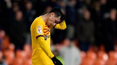 Soccer Football - LaLiga - Valencia v FC Barcelona - Mestalla, Valencia, Spain - December 16, 2023 FC Barcelona's Pedri looks dejected after the match REUTERS/Pablo Morano