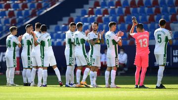 VALENCIA, SPAIN - NOVEMBER 21: Players of Elche CF line up prior to the La Liga Santader match between Levante UD and Elche CF at Ciutat de Valencia Stadium on November 21, 2020 in Valencia, Spain. Football Stadiums around Europe remain empty due to the C