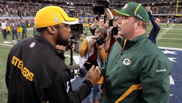ARLINGTON, TX - FEBRUARY 06: Head coach Mike Tomlin of the Pittsburgh Steelers and head coach Mike McCarthy of the Green Bay Packers speak prior to Super Bowl XLV at Cowboys Stadium on February 6, 2011 in Arlington, Texas.  (Photo by Jamie Squire/Getty Images)