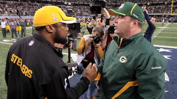 ARLINGTON, TX - FEBRUARY 06: Head coach Mike Tomlin of the Pittsburgh Steelers and head coach Mike McCarthy of the Green Bay Packers speak prior to Super Bowl XLV at Cowboys Stadium on February 6, 2011 in Arlington, Texas.  (Photo by Jamie Squire/Getty Images)