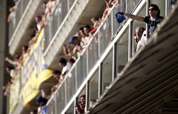 Diego Armando Maradona supporting Boca Juniors at La Bombonera.