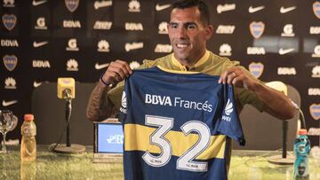 Boca Juniors&#039; newly returned player Carlos Tevez poses with his new jersey during his official presentation at Los Cardales, Buenos Aires province, on January 09, 2018. 
 Former Manchester United and Juventus striker Carlos Tevez agreed a move back t