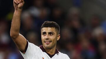 Manchester City's Spanish midfielder #16 Rodri (R) celebrates after scoring his team third goal during the English Premier League football match between Burnley and Manchester City at Turf Moor in Burnley, north-west England on August 11, 2023. (Photo by Darren Staples / AFP) / RESTRICTED TO EDITORIAL USE. No use with unauthorized audio, video, data, fixture lists, club/league logos or 'live' services. Online in-match use limited to 120 images. An additional 40 images may be used in extra time. No video emulation. Social media in-match use limited to 120 images. An additional 40 images may be used in extra time. No use in betting publications, games or single club/league/player publications. / 