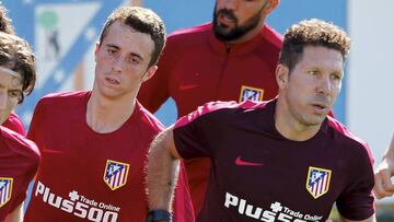 Diogo, tras el Cholo, en la sesión de ayer.