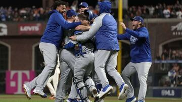 SAN FRANCISCO, CALIFORNIA - OCTOBER 14: The Los Angeles Dodgers celebrate after beating the San Francisco Giants 2-1 in game 5 of the National League Division Series at Oracle Park on October 14, 2021 in San Francisco, California.   Thearon W. Henderson/G