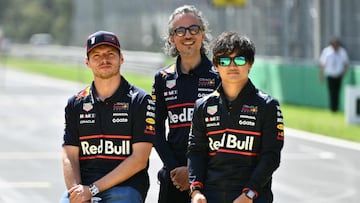 Red Bull Racing's Dutch driver Max Verstappen (L), RB's French team principal Laurent Mekies (C), Red Bull Racing's Japanese driver Yuki Tsunoda (R) look on during the drivers' parade prior to the Italian Formula One Grand Prix at the Autodromo Nazionale Monza circuit, in Monza, northern Italy, on September 7, 2025. (Photo by Marco BERTORELLO / AFP)