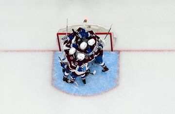 Colorado Avalanche center Nathan MacKinnon (29) goaltender Darcy Kuemper (35) defenseman Devon Toews (7) left wing Artturi Lehkonen (62) and defenseman Cale Makar (8) celebrate