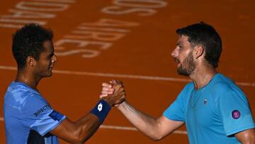 British Cameron Norrie (R) shakes hands with Peruvian Juan Pablo Varillas (L) at the end of the semi finals of the ATP 250 Argentina Open in Buenos Aires on February 18, 2023. (Photo by Luis ROBAYO / AFP) (Photo by LUIS ROBAYO/AFP via Getty Images)