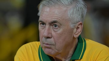 (FILES) Brazil's Italian head coach Carlo Ancelotti gestures while attending the second night of carnival parade in the Sambadrome in Sao Paulo, Brazil, on February 14, 2026. Ahead of his next squad selection, Brazil manager Carlo Ancelotti will attend Santos' league match on March 10, 2026, although star player Neymar will once again be unavailable and cannot be seen in action. Ancelotti will announce his squad on March 16 for the friendly matches against France and Croatia on March 26 and 31 in the United States, in preparation for the 2026 World Cup. (Photo by NELSON ALMEIDA / AFP)