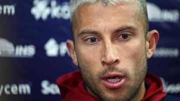 Costa Rica's defender Francisco Calvo talks to media members in the mixzone prior to their training session at the team's Al Ahli training camp in Doha on November 19, 2022, ahead of the Qatar 2022 World Cup football tournament. (Photo by OZAN KOSE / AFP)