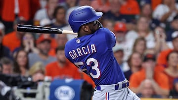 Oct 22, 2023; Houston, Texas, USA; Texas Rangers right fielder Adolis Garcia (53) hits a grand slam against the Houston Astros in the ninth inning during game six of the ALCS for the 2023 MLB playoffs at Minute Maid Park. Mandatory Credit: Troy Taormina-USA TODAY Sports