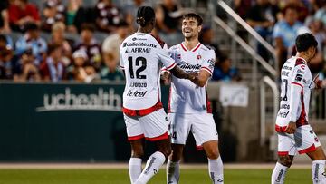 Aug 3, 2025; Commerce City, CO, USA; Club Tijuana defender Jackson Porozo (12) celebrates his goal with defender Unai Bilbao (4) in the first half against the Colorado Rapids at DICK'S Sporting Goods Park. Mandatory Credit: Isaiah J. Downing-Imagn Images