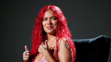 Karol G gestures as she speaks during a news conference at the 62th International Song Festival in Vina del Mar, Chile February 19, 2023. REUTERS/Rodrigo Garrido