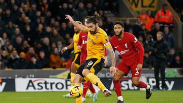 Soccer Football - Premier League - Wolverhampton Wanderers v Liverpool - Molineux Stadium, Wolverhampton, Britain - February 4, 2023 Wolverhampton Wanderers' Ruben Neves scores their third goal Action Images via Reuters/Ed Sykes EDITORIAL USE ONLY. No use with unauthorized audio, video, data, fixture lists, club/league logos or 'live' services. Online in-match use limited to 75 images, no video emulation. No use in betting, games or single club /league/player publications. Please contact your account representative for further details.