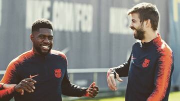 Samuel Umtiti y Gerard Piqu&eacute; ri&eacute;ndose en un entrenamiento.