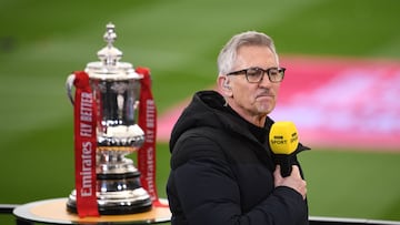 (FILES) In this file photo taken on March 21, 2021, BBC TV presenter Gary Lineker prepares to broadcast inside the make-shift television studio ahead of the English FA Cup quarter-final football match between Leicester City and Manchester United at King Power Stadium in Leicester, central England. - Gary Lineker will "step back" from presenting his football show until he and the BBC have reached an "agreed and clear position" on his use of social media, the corporation said Friday, March 10. (Photo by Oli SCARFF / POOL / AFP) / RESTRICTED TO EDITORIAL USE. No use with unauthorized audio, video, data, fixture lists, club/league logos or 'live' services. Online in-match use limited to 120 images. An additional 40 images may be used in extra time. No video emulation. Social media in-match use limited to 120 images. An additional 40 images may be used in extra time. No use in betting publications, games or single club/league/player publications. / 