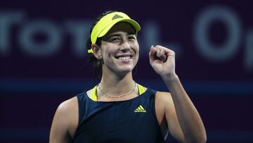 DOHA, QATAR - MARCH 03: Garbine Muguruza of Spain celebrates victory after winning her Round of 16 singles match against Aryna Sabalenka of Belarus during Day Three of the Qatar Total Open 2021 at Khalifa International Tennis and Squash Complex on March 03, 2021 in Doha, Qatar. (Photo by Mohamed Farag/Getty Images)