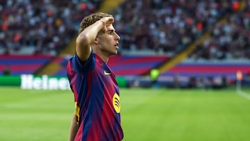 Barcelona's Spanish midfielder #16 Fermin Lopez celebrates scoring their first goal during the UEFA Champions League league phase match-day 3 football match between FC Barcelona and Olympiakos FC at Estadi Olimpic Lluis Companys in Barcelona on October 21, 2025. (Photo by Josep LAGO / AFP)