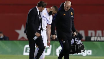 Benzema leaves the Son Moix field after picking up an injury in Real Madrid's 3-0 LaLiga win over Real Mallorca.