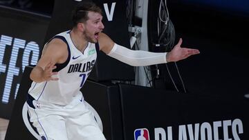 Dallas Mavericks&#039; Luka Doncic (77) pleads with a referee during the second half of an NBA first round playoff game against the Los Angeles Clippers Sunday, Aug. 30, 2020, in Lake Buena Vista, Fla. (AP Photo/Ashley Landis)
