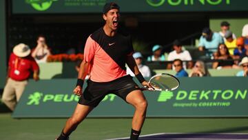 KEY BISCAYNE, FL - MARCH 24: Thanasi Kokkinakis of Australia celebrates match point against Roger Federer of Switzerland in their second round match during the Miami Open Presented by Itau at Crandon Park Tennis Center on March 24, 2018 in Key Biscayne, F