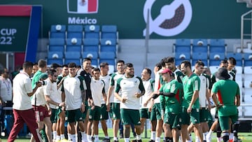 Mexico's players joke with Mexico's forward Alexis Vega (C) during a training session at Al Khor SC in Al Khor, north of Doha, on November 25, 2022, on the eve of the Qatar 2022 World Cup football match between Argentina and Mexico. (Photo by Alfredo ESTRELLA / AFP)