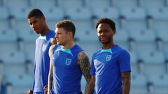 Soccer Football - FIFA World Cup Qatar 2022 - England Training - Al Wakrah SC stadium, Al Wakrah, Qatar - December 3, 2022 England's Marcus Rashford, Kieran Trippier and Raheem Sterling during training REUTERS/Hannah Mckay