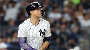 NEW YORK, NEW YORK - JUNE 19: Giancarlo Stanton #27 of the New York Yankees hits a three-run home run against the Baltimore Orioles during the seventh inning at Yankee Stadium on June 19, 2024 in the Bronx borough of New York City.   Luke Hales/Getty Images/AFP (Photo by Luke Hales / GETTY IMAGES NORTH AMERICA / Getty Images via AFP)