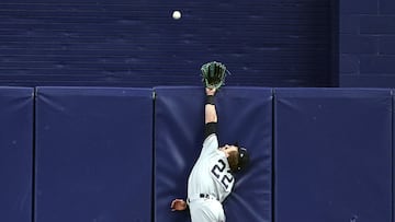 May 5, 2023; St. Petersburg, Florida, USA; New York Yankees center fielder Harrison Bader (22) attempts to get Tampa Bay Rays first baseman Yandy Diaz (2) (not pictured) home run ball during the third inning at Tropicana Field. Mandatory Credit: Kim Klement-USA TODAY Sports