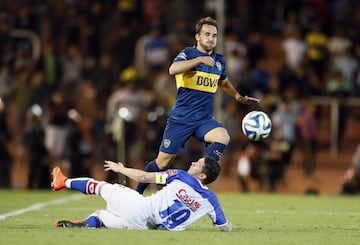 En julio del 2014, el jugador dejó Colo Colo para fichar en Boca.  No pudo afianzarse y regresó para jugar en la UC.
