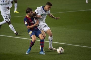 Sergi Roberto y Sofian Chakla.