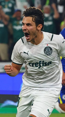 Palmeiras' midfielder Raphael Veiga celebrates after scoring a penalty during the 2021 FIFA Club World Cup final football match between Brazil's Palmeiras and England's Chelsea at Mohammed Bin Zayed stadium in Abu Dhabi, on February 12, 2022. (Photo by Giuseppe CACACE / AFP)