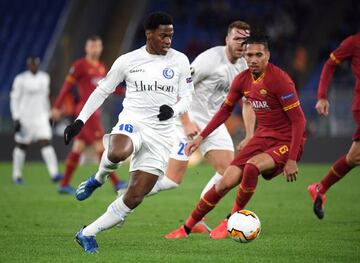 Gent's Jonathan David in action with AS Roma's Chris Smalling in the Europa League, Round of 32 First Leg.