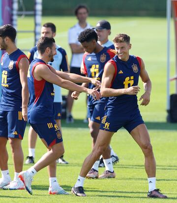 Koke y Marcos LLorente.