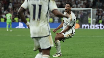 Real Madrid's English midfielder #5 Jude Bellingham celebrates scoring his team's first goal during the UEFA Champions League 1st round day 1 group C football match between Real Madrid and Union Berlin at the Santiago Bernabeu stadium in Madrid on September 20, 2023. (Photo by Thomas COEX / AFP)