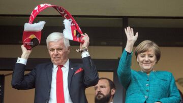 Angela Merkel junto a Werner Spinner.