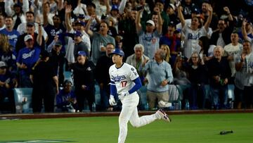 LOS ANGELES, CALIFORNIA - OCTOBER 17: Shohei Ohtani #17 of the Los Angeles Dodgers runs to first after hitting a home run in the fourth inning against the Milwaukee Brewers in game four of the National League Championship Series at Dodger Stadium on October 17, 2025 in Los Angeles, California. Harry How/Getty Images/AFP (Photo by Harry How / GETTY IMAGES NORTH AMERICA / Getty Images via AFP)