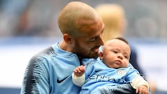 David Silva appears with his son ahead of Manchester City's first home game of the season
