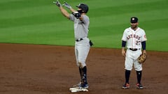 HOUSTON, TEXAS - OCTOBER 19: Giancarlo Stanton #27 of the New York Yankees celebrates a double during the third inning against the Houston Astros in game one of the American League Championship Series at Minute Maid Park on October 19, 2022 in Houston, Texas.   Rob Carr/Getty Images/AFP