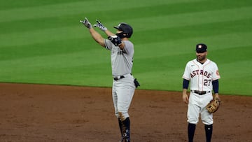 HOUSTON, TEXAS - OCTOBER 19: Giancarlo Stanton #27 of the New York Yankees celebrates a double during the third inning against the Houston Astros in game one of the American League Championship Series at Minute Maid Park on October 19, 2022 in Houston, Texas. Rob Carr/Getty Images/AFP