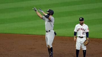 HOUSTON, TEXAS - OCTOBER 19: Giancarlo Stanton #27 of the New York Yankees celebrates a double during the third inning against the Houston Astros in game one of the American League Championship Series at Minute Maid Park on October 19, 2022 in Houston, Texas.   Rob Carr/Getty Images/AFP