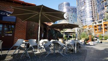 A general view shows an empty restaurant in the normally busy Elizabeth Quay area in Perth on January 31, 2021, as authorities announced a snap five-day lockdown after a security guard at a quarantine hotel tested positive for Covid-19 ending Western Aust