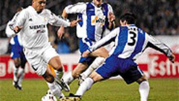 <b>MÁS SÓLIDOS</B>. Lopo y David García jugaron ante el Madrid uno de los partidos más serios de la temporada. Junto a Soldevilla están haciendo un buen curso.